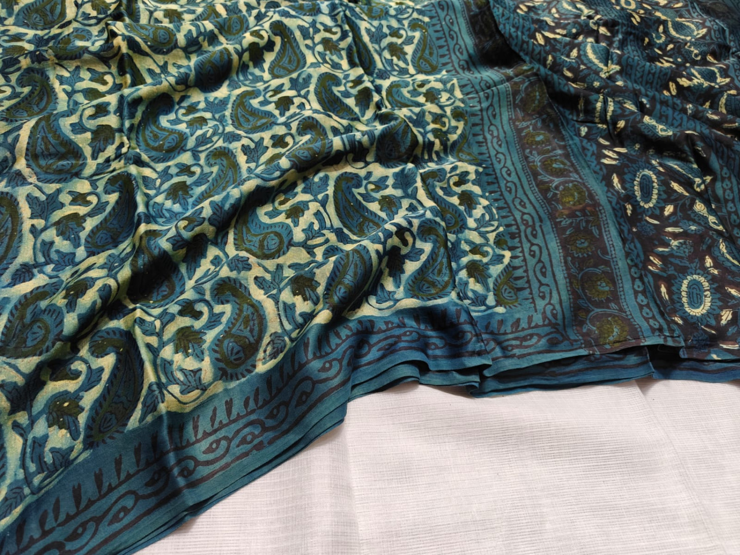Deep teal blue Pure Modal Silk Ajrakh Vanaspati Saree with printed blouse