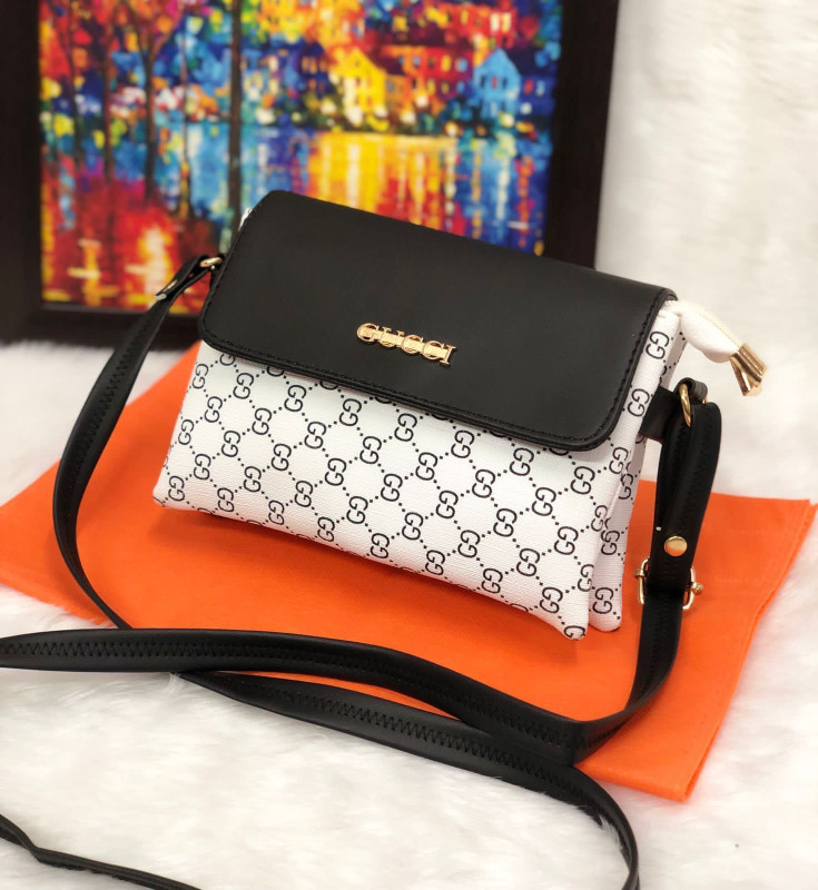 Black and White Faux Leather Monogram Flap Sling Bag.