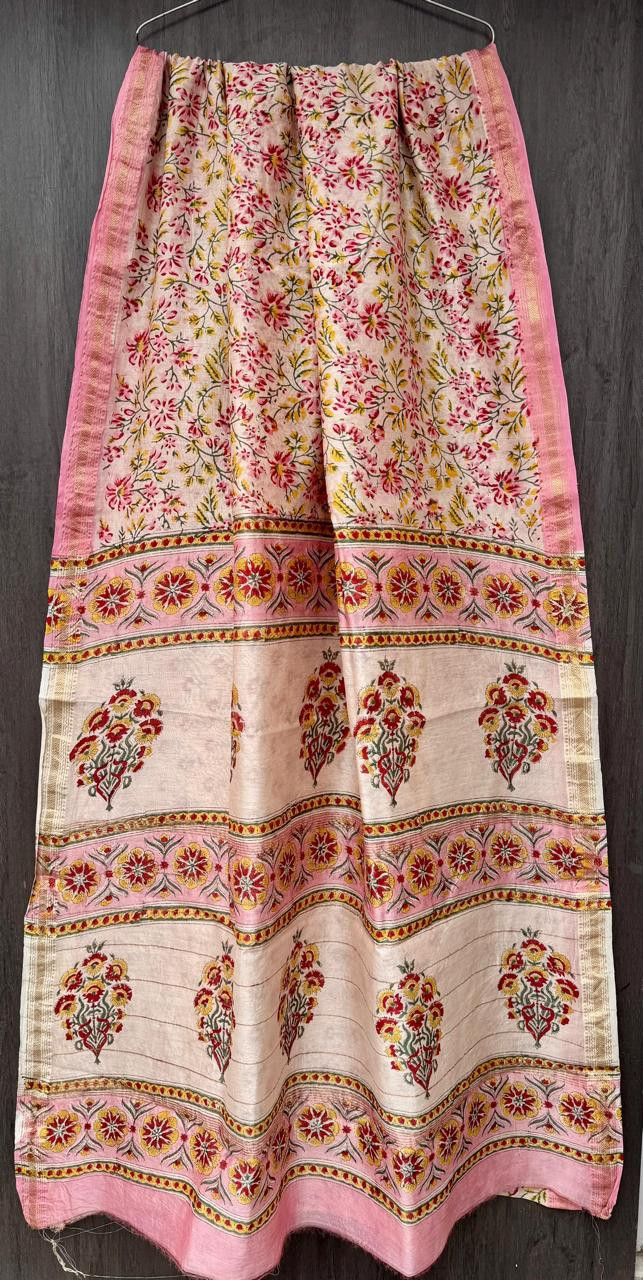 beige and pink floral hand-block printed chanderi silk saree with a gold zari border.