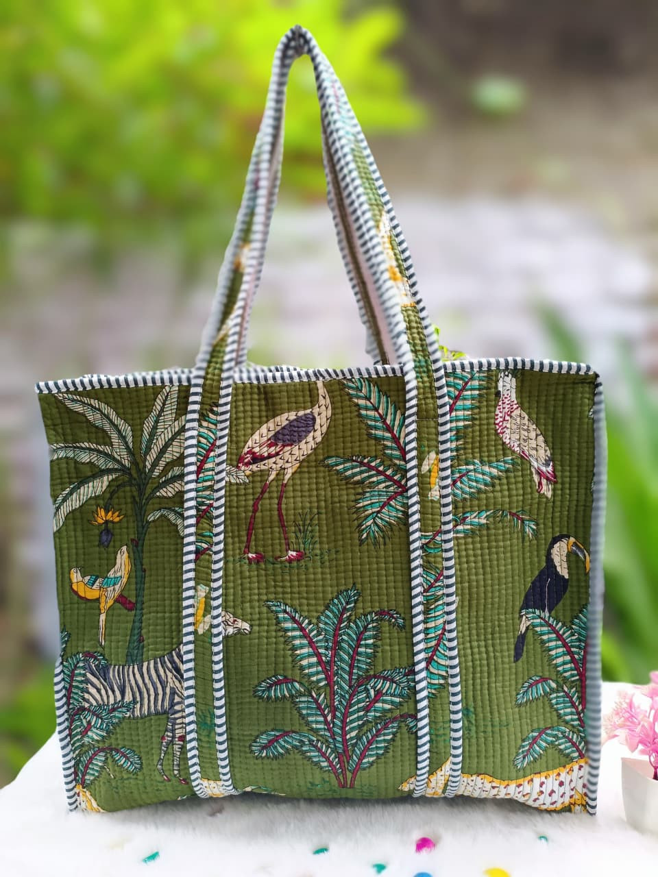 Olive green jungle safari print quilted cotton tote bag with multicolor wildlife design.