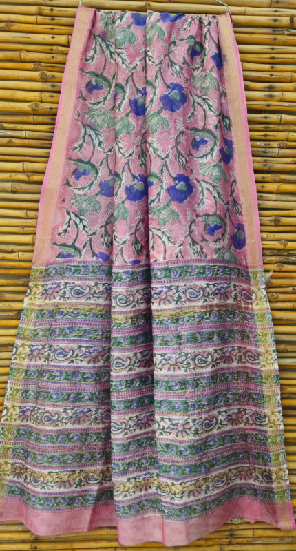 pink hand-block printed Maheshwari or Chanderi silk/cotton blend saree with blue and green floral and paisley motifs and a pink zari border