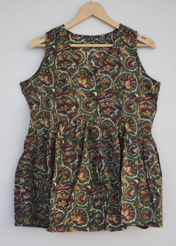 olive green, and yellow hand-block printed, floral or paisley pattern cotton sleeveless peplum top.
