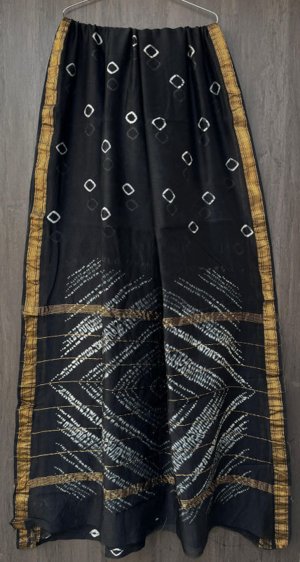 Black Maheshwari silk cotton blend bandhani saree with a gold zari borde