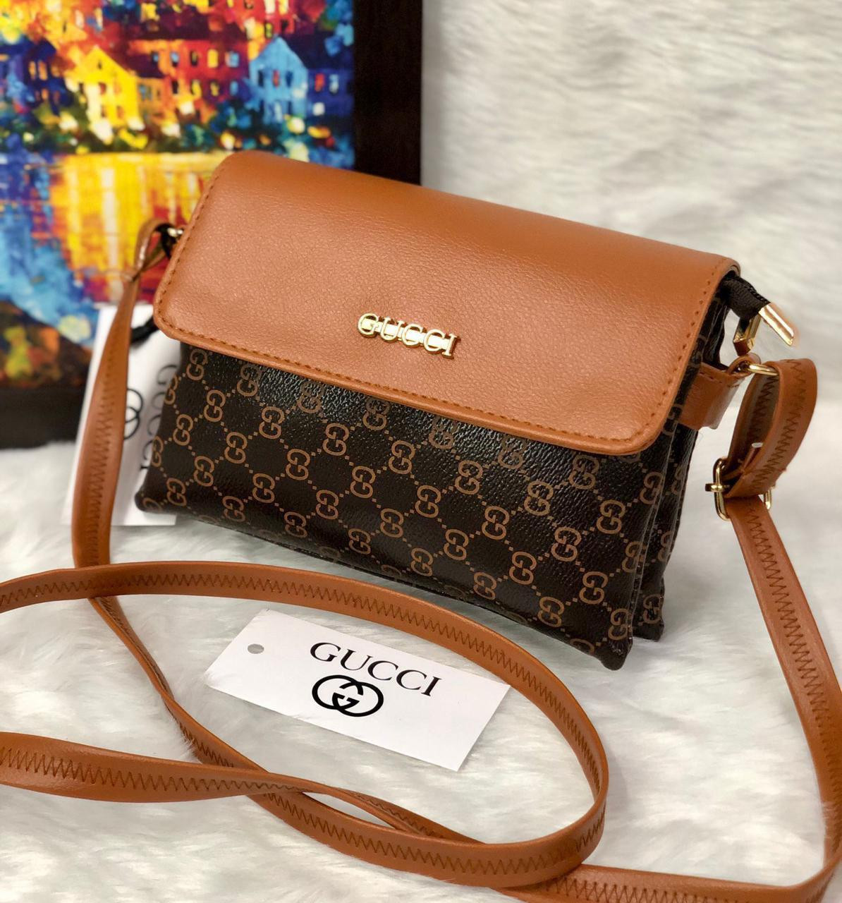 Beige and brown bag is a coated-canvas and faux-leather sling bag featuring a monogram print and a brown flap closure.