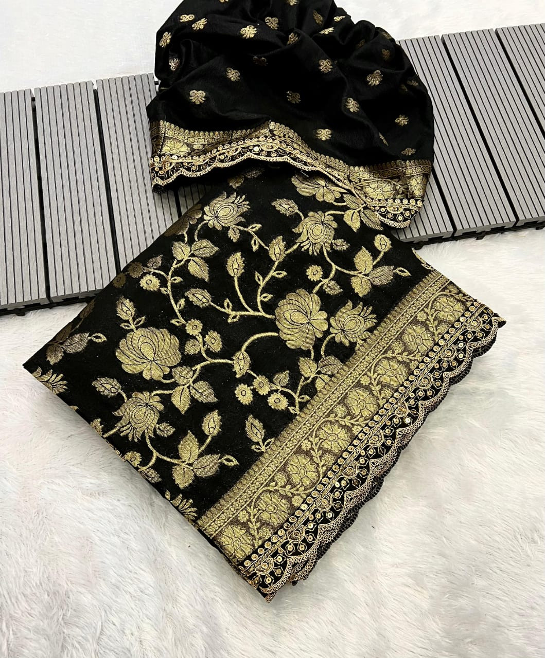 Black and Gold Khaddi Georgette ethnic outfits with a floral brocade design