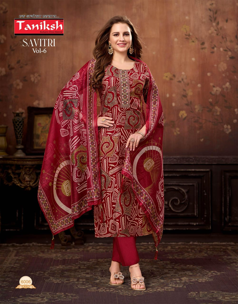 Taniksh Savitri suit in maroon with abstract print.
